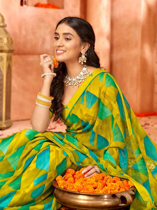 Latest dusty yellow georgette saree with print