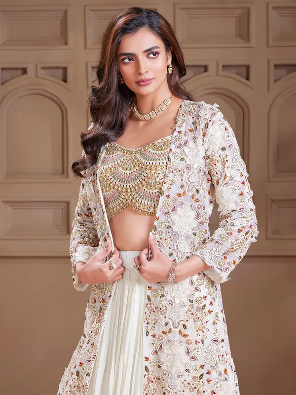 Latest georgette cream shrug style lehenga choli