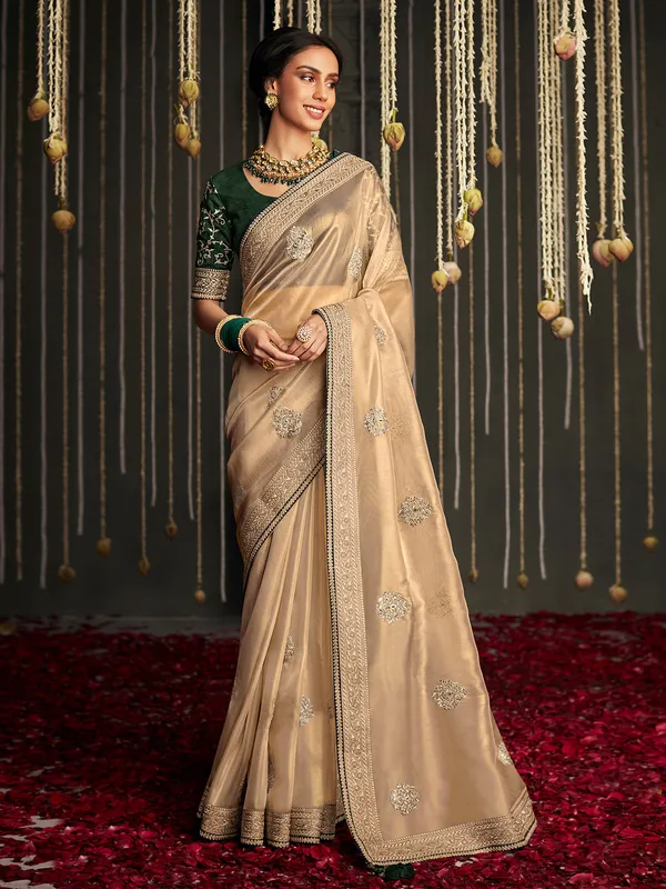 Latest golden tissue silk saree for reception