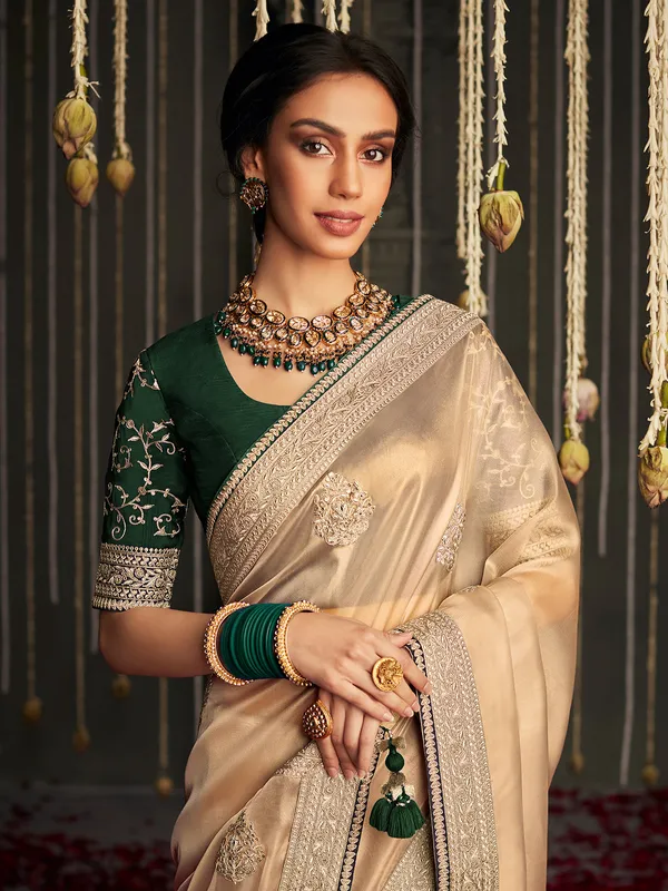 Latest golden tissue silk saree for reception