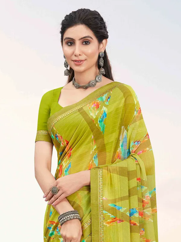Latest green georgette printed saree