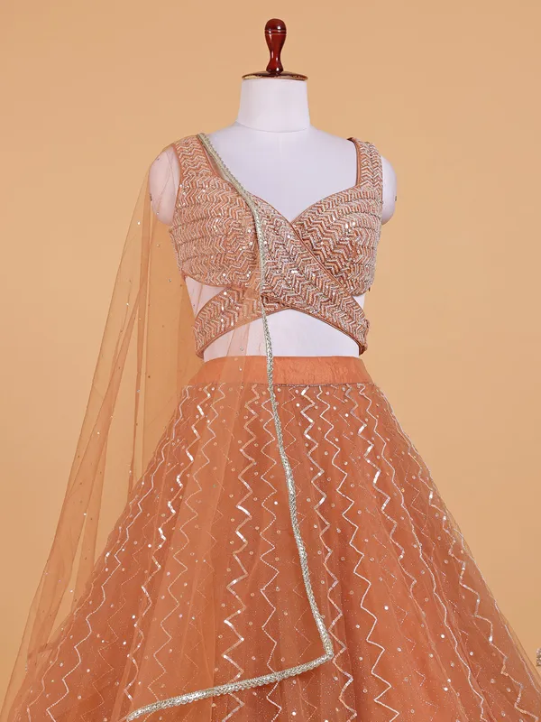 Latest orange net lehenga choli