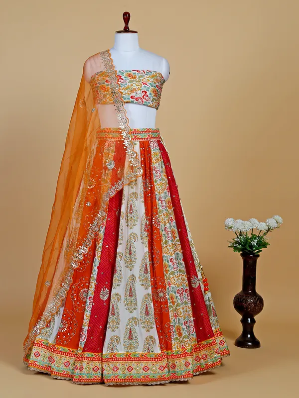 Latest orange printed silk lehenga choli