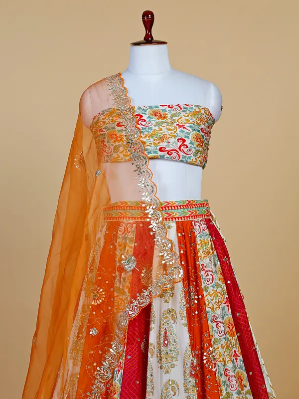 Latest orange printed silk lehenga choli
