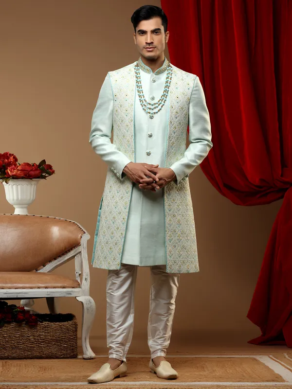 Latest pista green hued cotton silk wedding wear indowestern