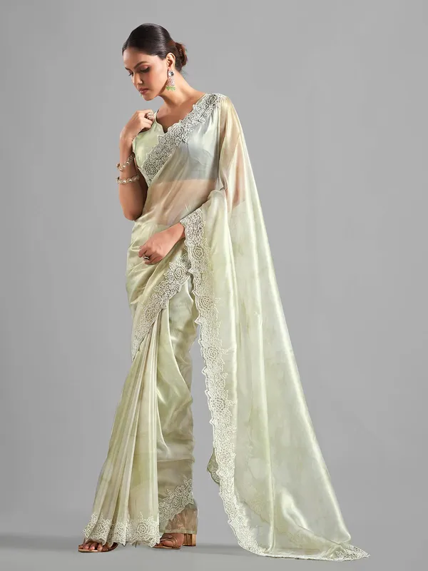 Latest pista green tissue silk saree