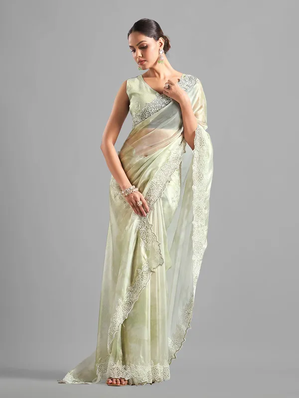 Latest pista green tissue silk saree