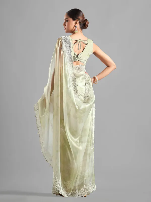 Latest pista green tissue silk saree