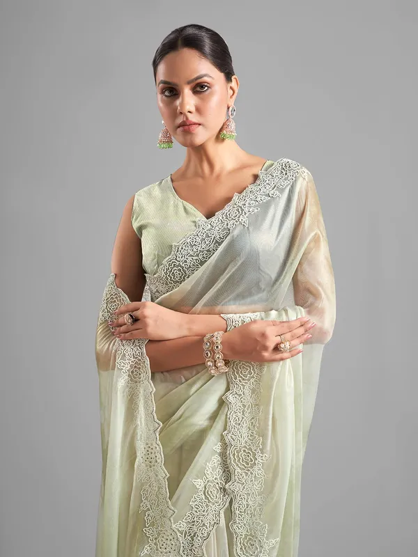 Latest pista green tissue silk saree
