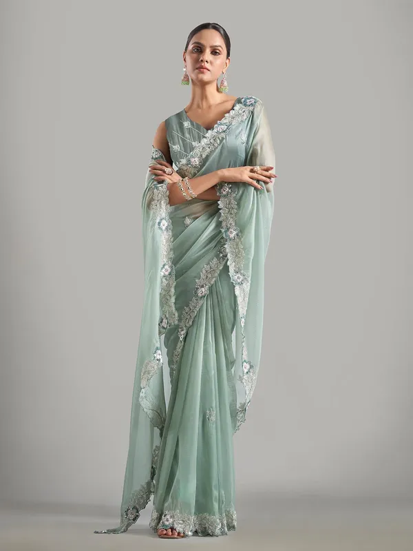 Latest pista green tissue silk unstitched saree