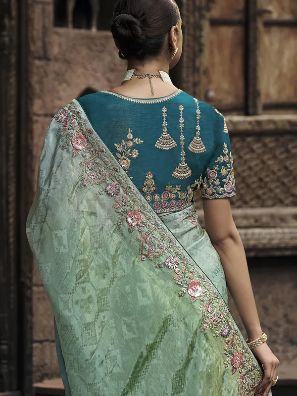 Latest pista green wedding style saree