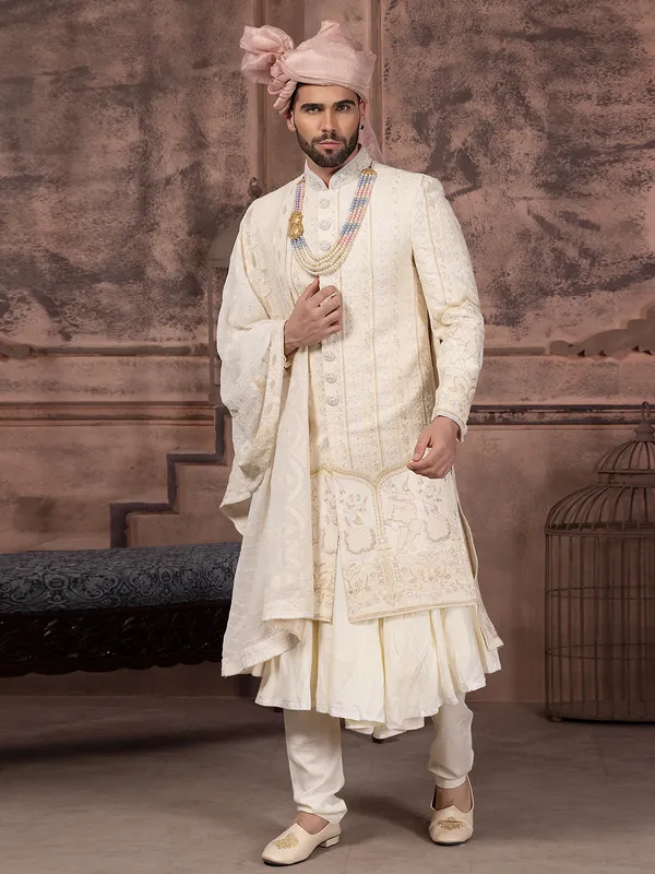 Latest silk sherwani with embroidery in cream
