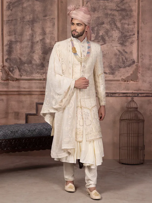Latest silk sherwani with embroidery in cream
