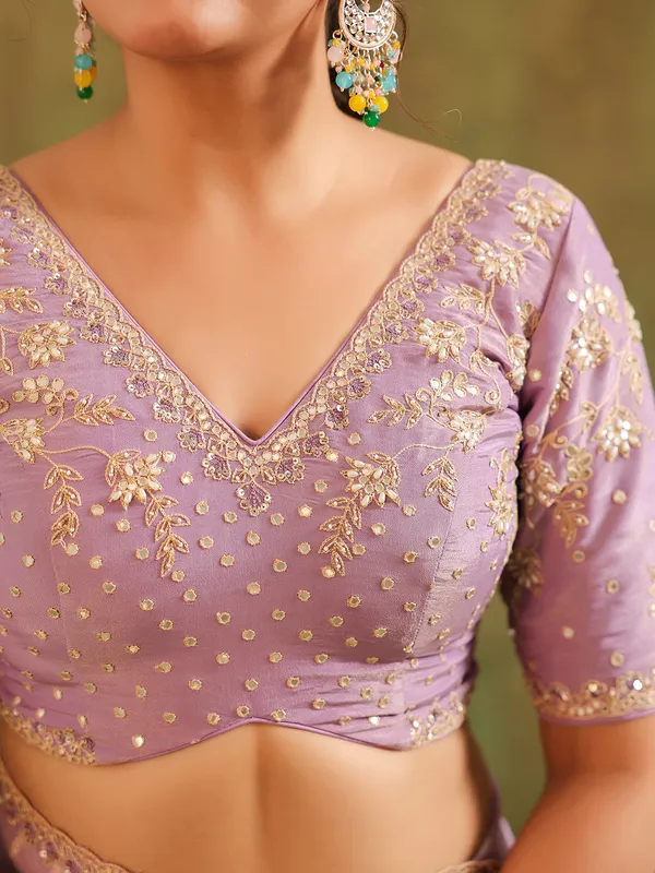 Lavender silk zari worked saree for festive wear