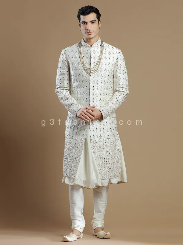 Lavish groom wear raw silk sherwani in cream