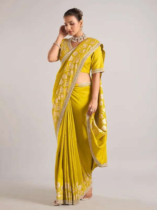 Lemon green pure dola silk saree with sequin work