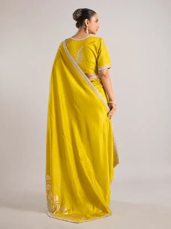Lemon green pure dola silk saree with sequin work