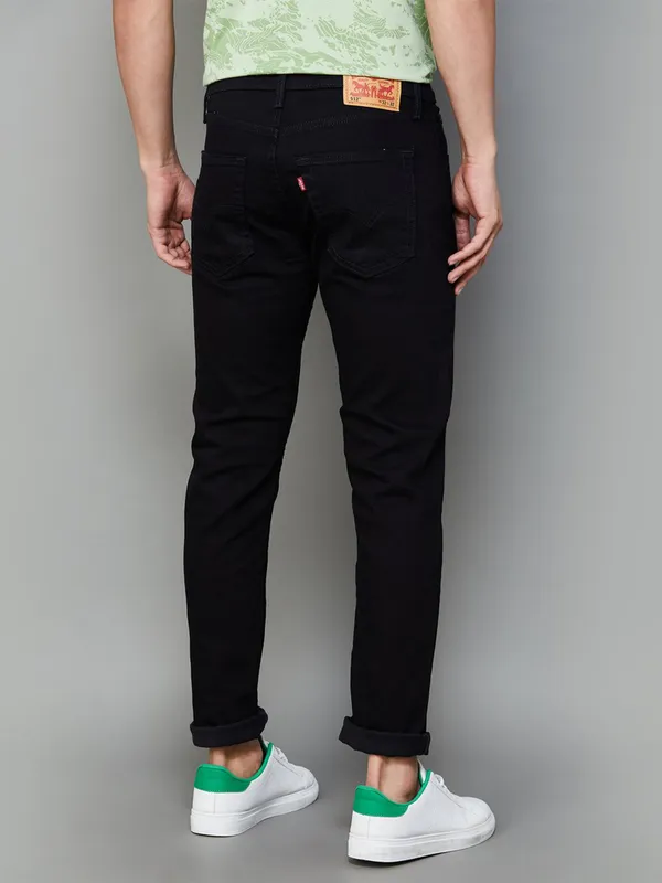 LEVIS black solid slim tapered fit jeans