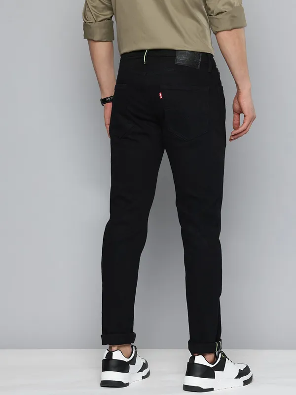 LEVIS solid black slim taper denim jeans for men