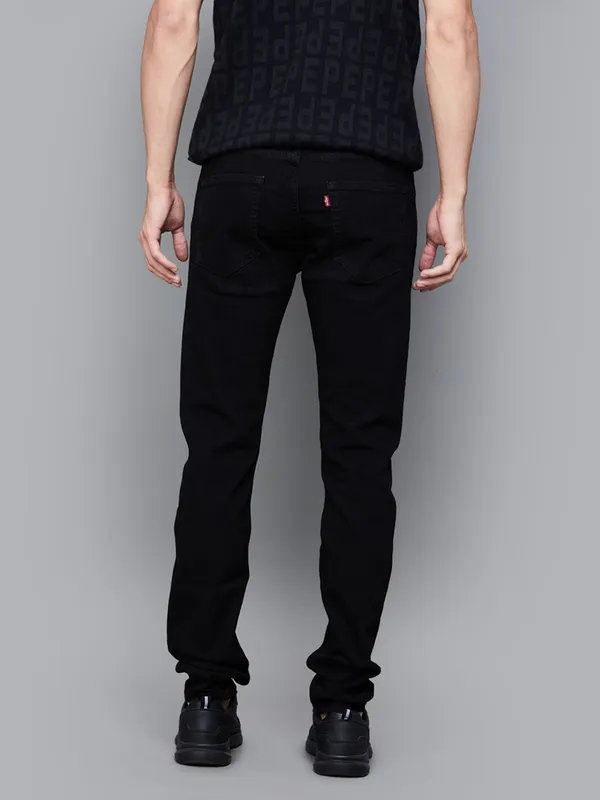 LEVIS solid black tapered fit denim jeans