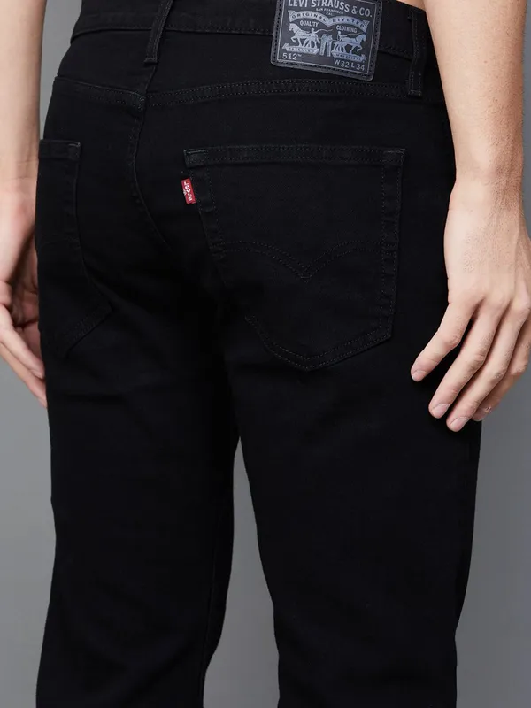 LEVIS solid black tapered fit denim jeans