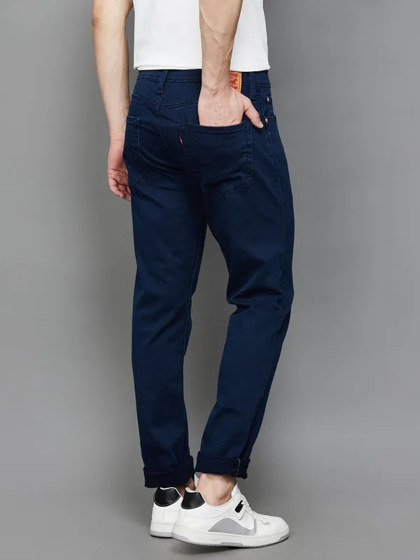 LEVIS solid indigo blue slim taper denim jeans