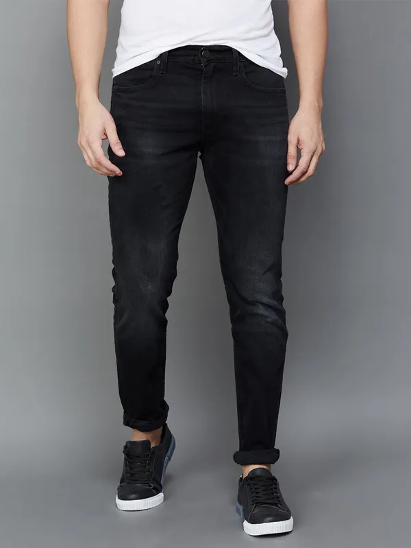 Levis washed black 512 slim taper jeans