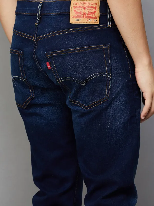 LEVIS washed dark blue slim taper fit denim