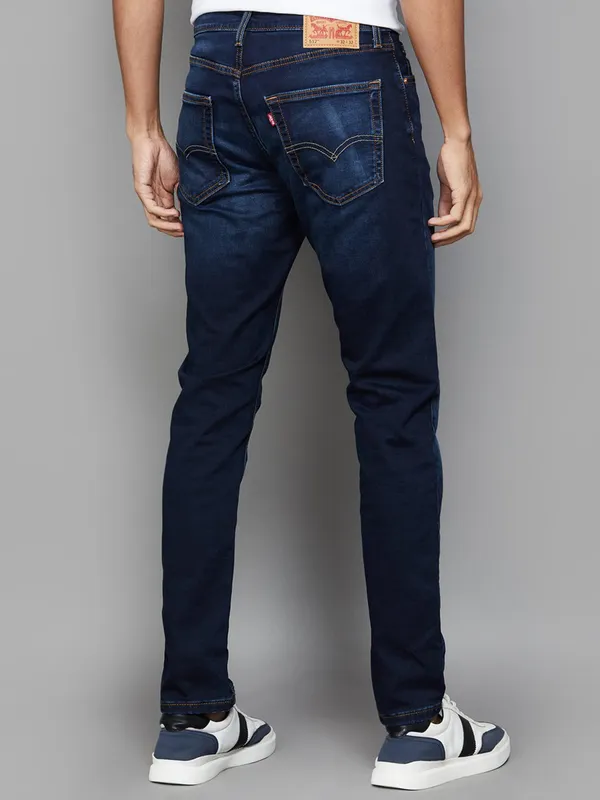LEVIS washed navy slim tapered fit jeans