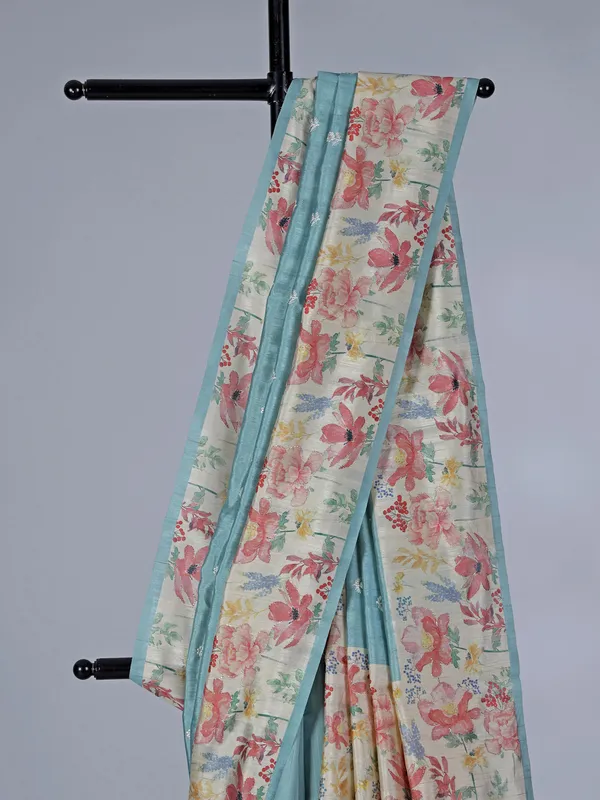 Light blue floral semi silk saree with resham work