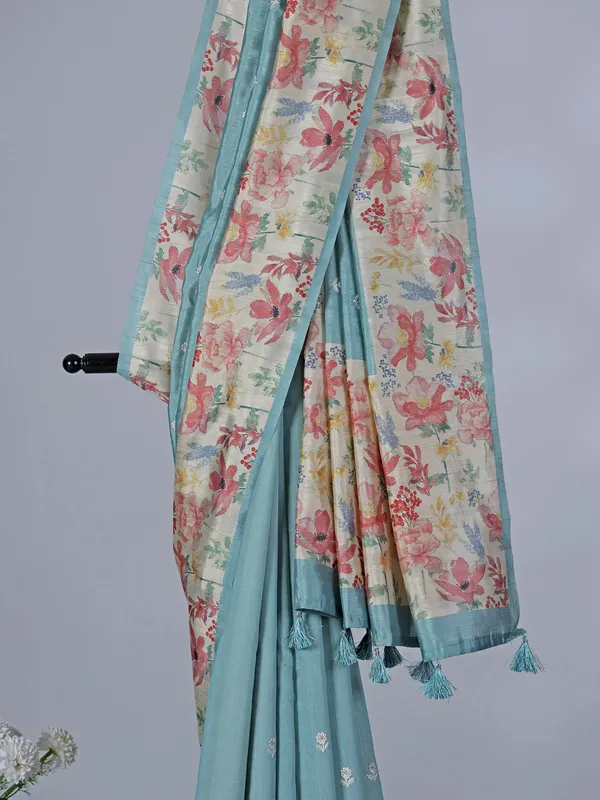Light blue floral semi silk saree with resham work