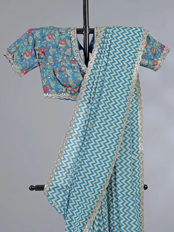 Light blue muslin silk printed saree with gota touch