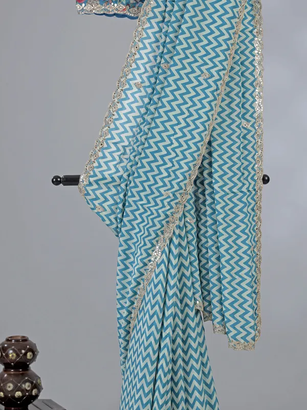 Light blue muslin silk printed saree with gota touch
