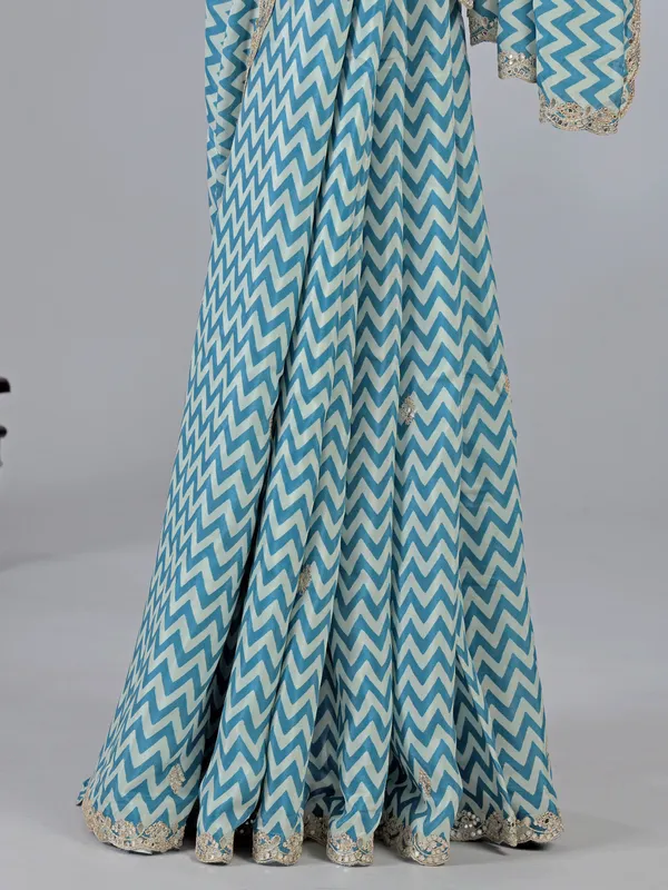 Light blue muslin silk printed saree with gota touch