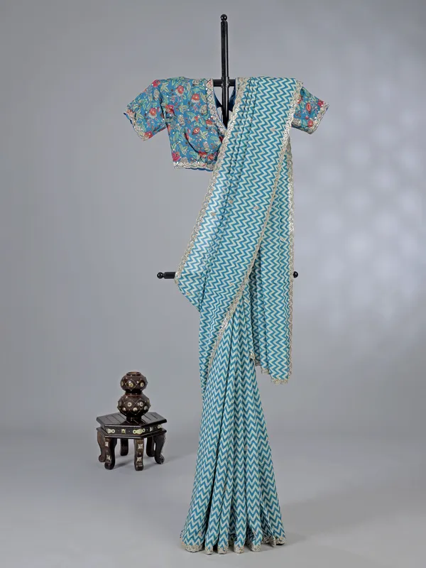 Light blue muslin silk printed saree with gota touch