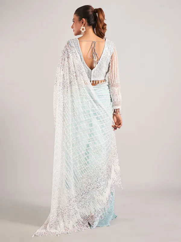 Light blue net with designer saree