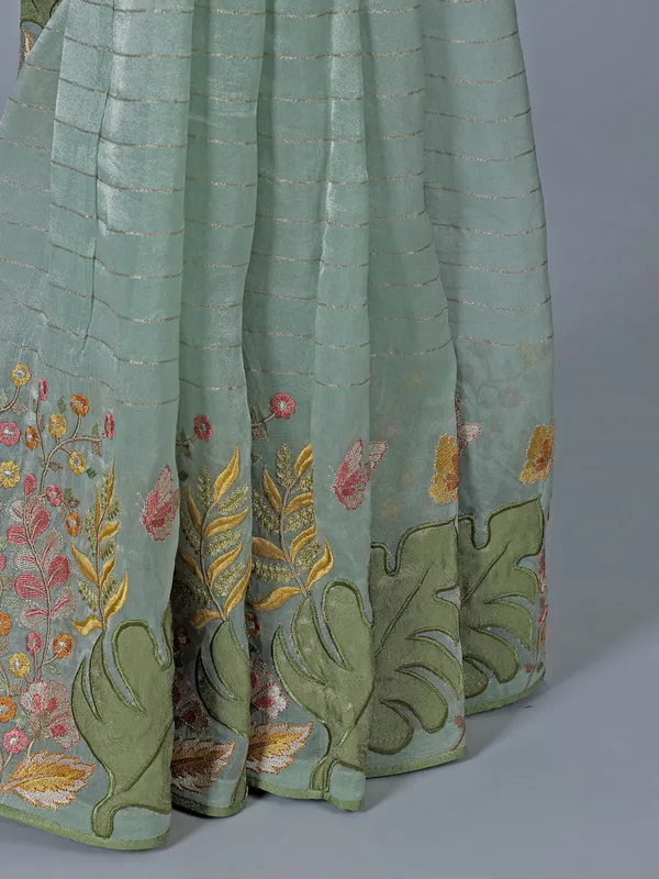 Light blue organza saree with unstitched blouse