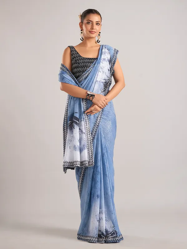 Light blue party wear saree with sequins weaving