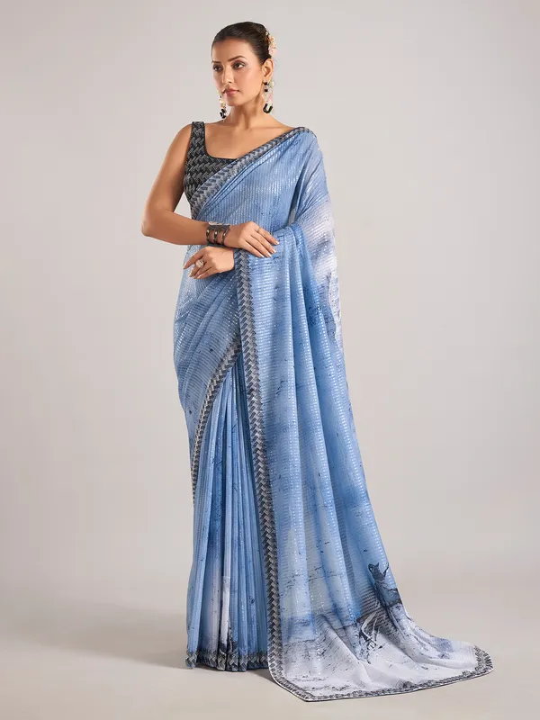 Light blue party wear saree with sequins weaving