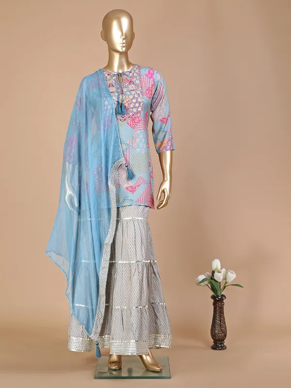 Light blue silk printed sharara suit with dupatta