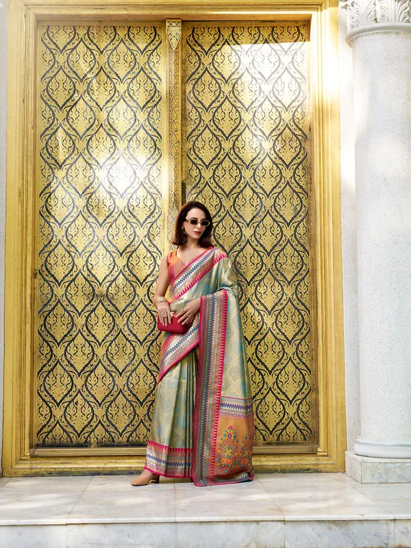 Light blue tissue silk saree in zari weaving