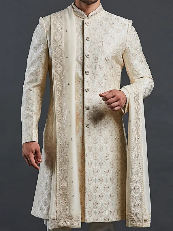 Light cream raw silk shewani in rich work for men