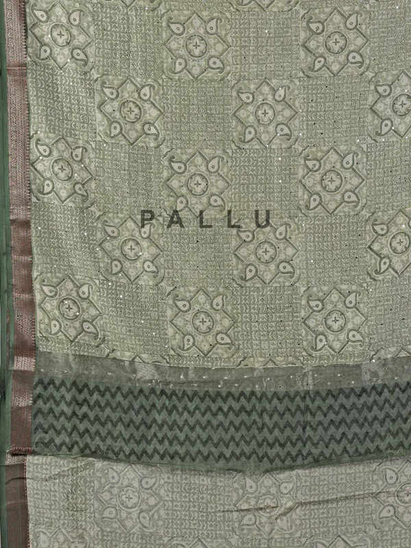 Light green cotton saree with mirror ornamentation