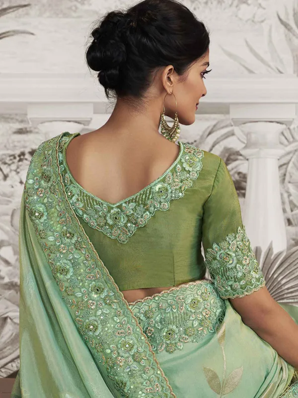 Light green festive wear silk saree with embroidery
