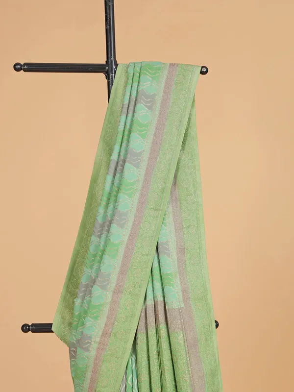 Light green georgette saree with zari weaving