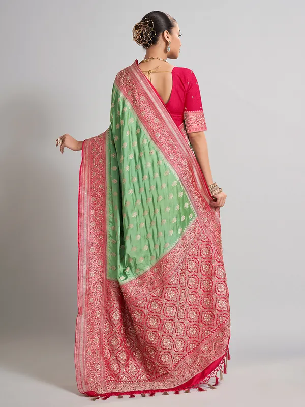 Light green satin silk saree with contrast border detailing