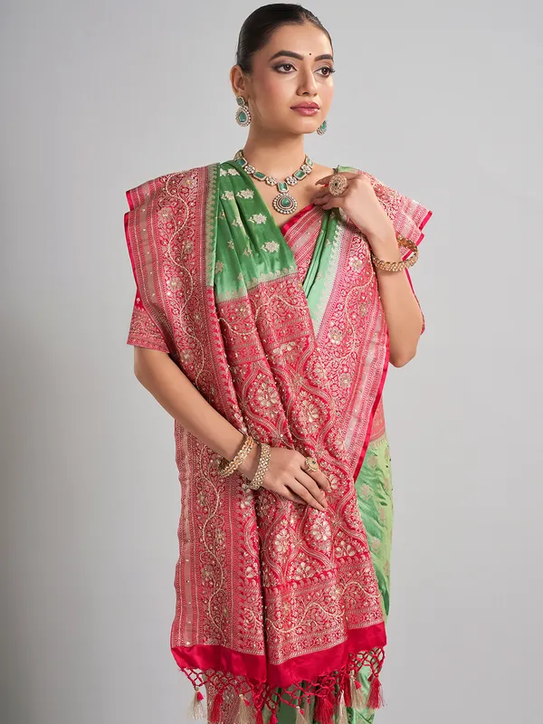 Light green satin silk saree with contrast border detailing