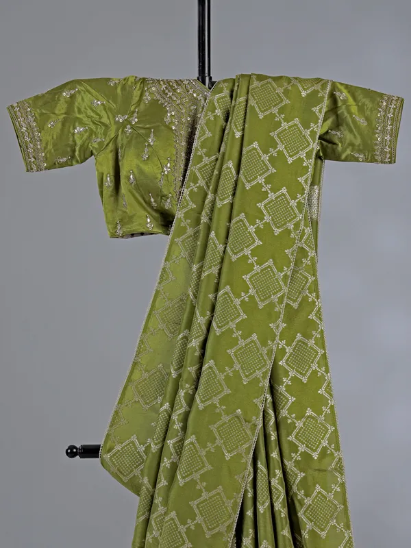 Light green silk saree with ready made blouse