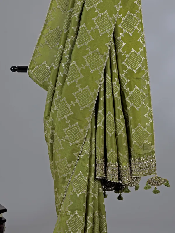 Light green silk saree with ready made blouse