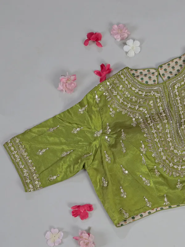 Light green silk saree with ready made blouse